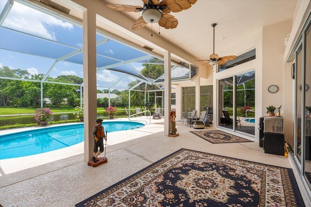 10312 Inverness Way, Port Saint Lucie, FL 34986 - swimming pool featuring a patio area, a ceiling fan, and a lanai