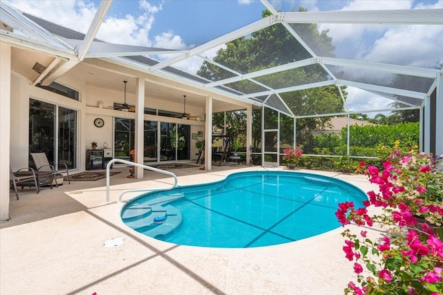 10312 Inverness Way, Port Saint Lucie, FL 34986 - swimming pool featuring a patio, a ceiling fan, and glass enclosure