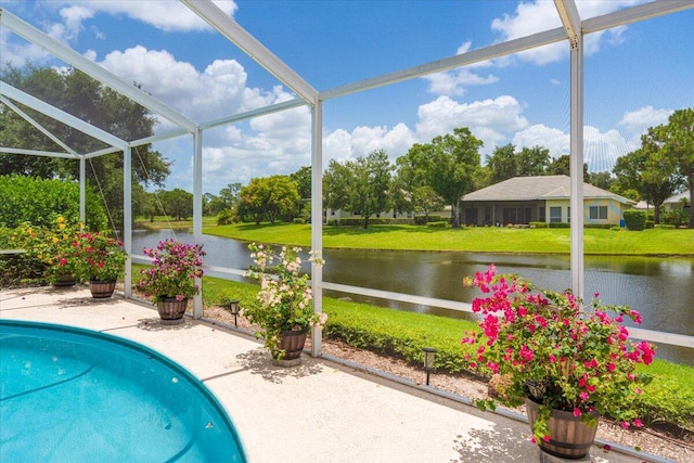 10312 Inverness Way, Port Saint Lucie, FL 34986 - swimming pool with a water view, a patio, a lanai, and a yard