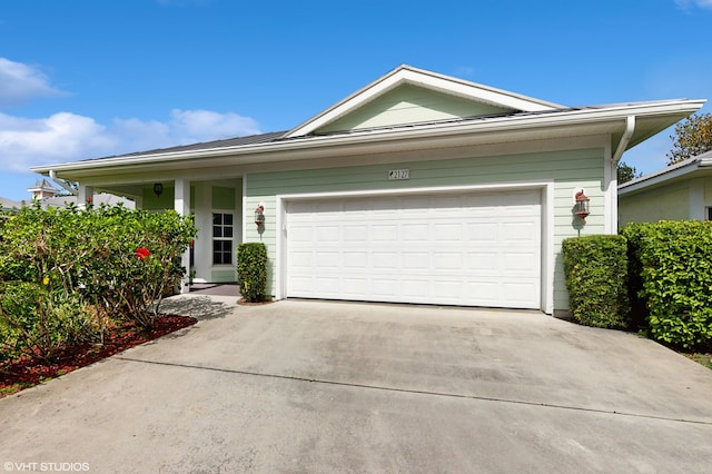 2127 NW Tilia Trl, Stuart, FL 34994 - single story home with driveway and an attached garage