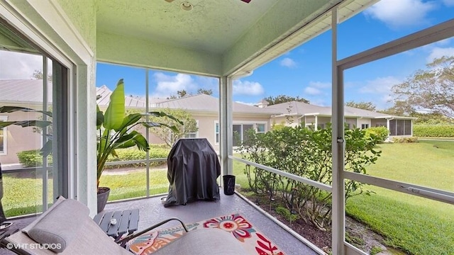 2127 NW Tilia Trl, Stuart, FL 34994 - sunroom / solarium featuring a ceiling fan