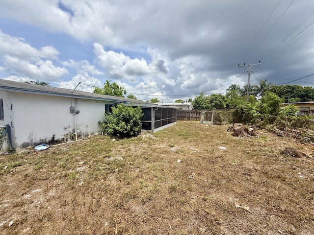 1376 Meadowbrook Dr, West Palm Beach, FL 33417 - view of yard featuring a sunroom