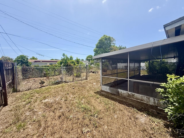 1376 Meadowbrook Dr, West Palm Beach, FL 33417 - fenced backyard with a sunroom