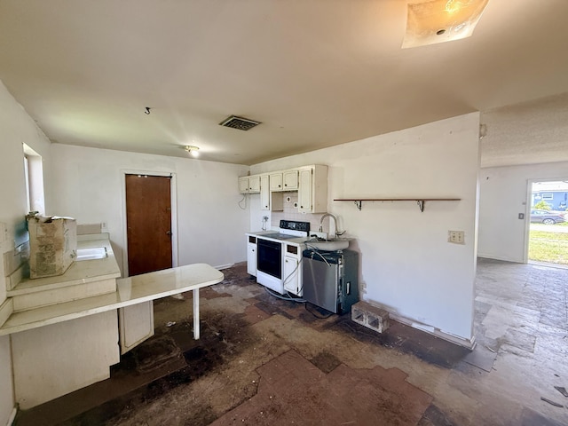 1376 Meadowbrook Dr, West Palm Beach, FL 33417 - kitchen featuring white electric range oven, a sink, white cabinetry, and a peninsula