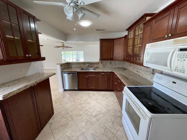 9319 Southampton Pl, Boca Raton, FL 33434 - kitchen with white appliances, a ceiling fan, a peninsula, and light stone counters