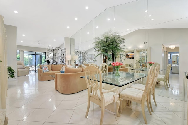5319 Palmetto Palm Ct Unit A, Boynton Beach, FL 33437 - dining area featuring light tile patterned floors, high vaulted ceiling, and recessed lighting