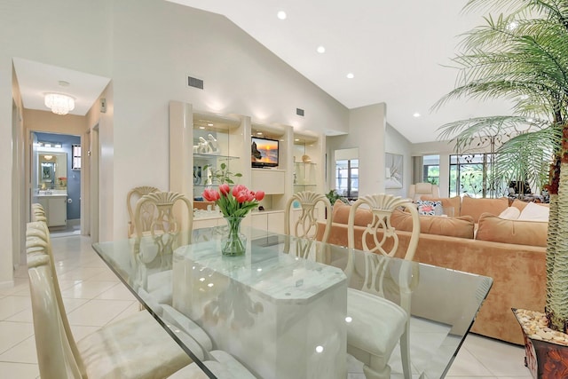 5319 Palmetto Palm Ct Unit A, Boynton Beach, FL 33437 - dining room with light tile patterned floors, high vaulted ceiling, and recessed lighting