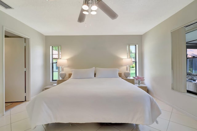 5319 Palmetto Palm Ct Unit A, Boynton Beach, FL 33437 - tiled bedroom featuring ceiling fan