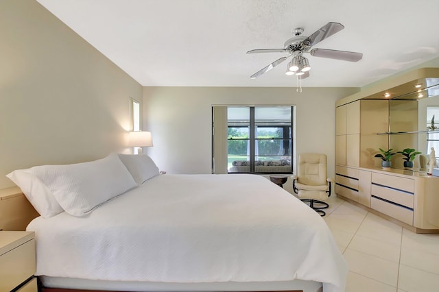 5319 Palmetto Palm Ct Unit A, Boynton Beach, FL 33437 - bedroom featuring light tile patterned floors and a ceiling fan
