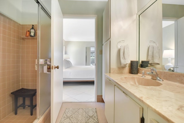 5319 Palmetto Palm Ct Unit A, Boynton Beach, FL 33437 - bathroom with ensuite bath, a shower stall, tile patterned floors, and vanity