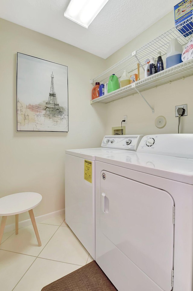 5319 Palmetto Palm Ct Unit A, Boynton Beach, FL 33437 - washroom with separate washer and dryer and light tile patterned floors