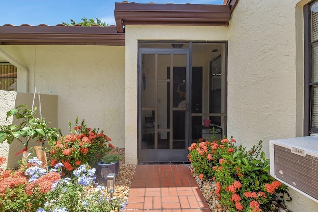 5319 Palmetto Palm Ct Unit A, Boynton Beach, FL 33437 - doorway to property with stucco siding