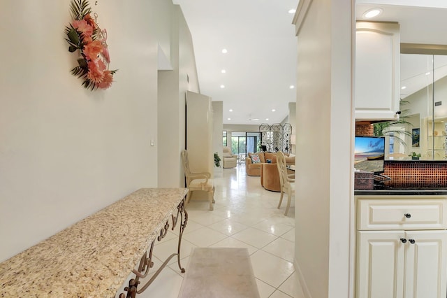 5319 Palmetto Palm Ct Unit A, Boynton Beach, FL 33437 - hallway featuring light tile patterned floors and recessed lighting