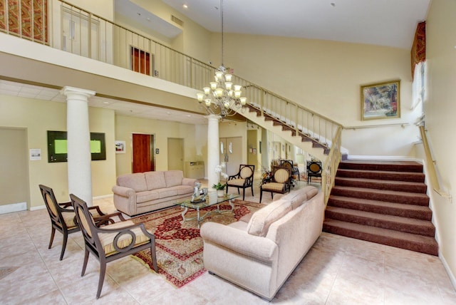 5319 Palmetto Palm Ct Unit A, Boynton Beach, FL 33437 - tiled living area featuring a high ceiling, decorative columns, and stairway