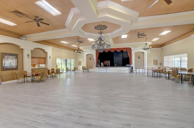 5319 Palmetto Palm Ct Unit A, Boynton Beach, FL 33437 - living room with ornamental molding, a ceiling fan, plenty of natural light, and a chandelier