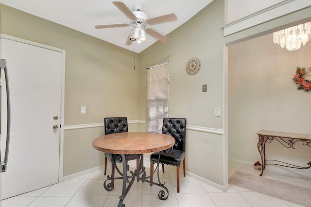 5319 Palmetto Palm Ct Unit A, Boynton Beach, FL 33437 - dining area with lofted ceiling, ceiling fan, light tile patterned floors, and a chandelier