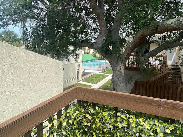 637 Executive Center Dr Unit N207, West Palm Beach, FL 33401 - wooden deck with stairway and a community pool