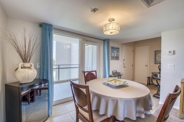 336 Golfview Rd Unit 518, North Palm Beach, FL 33408 - dining space with light tile patterned flooring