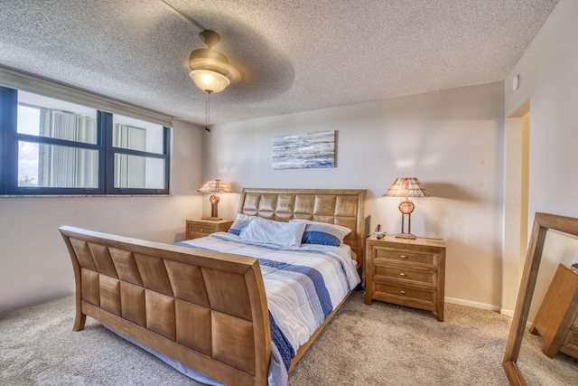 336 Golfview Rd Unit 518, North Palm Beach, FL 33408 - bedroom with carpet floors, a textured ceiling, and ceiling fan