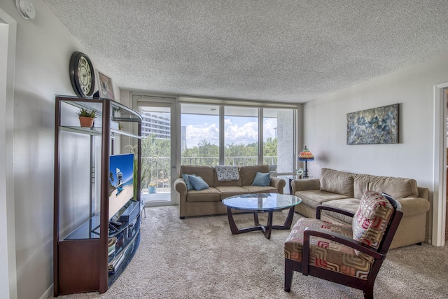 336 Golfview Rd Unit 518, North Palm Beach, FL 33408 - carpeted living room with a textured ceiling, healthy amount of natural light, and expansive windows