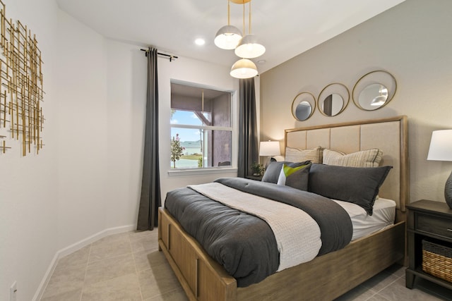 12755 SW Cattleya Ln Unit 224, Port Saint Lucie, FL 34987 - bedroom with light tile patterned flooring and baseboards