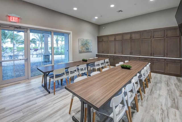12755 SW Cattleya Ln Unit 224, Port Saint Lucie, FL 34987 - dining space featuring light wood finished floors and recessed lighting
