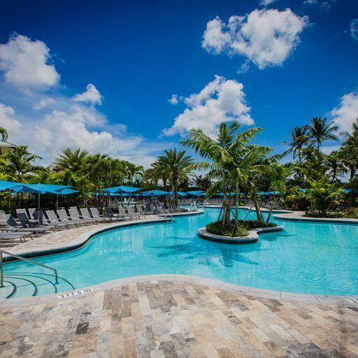 4220 NW 58th Ln, Boca Raton, FL 33496 - community pool featuring a patio