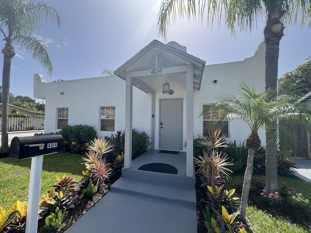 404 S M St Unit 1, Lake Worth Beach, FL 33460 - property entrance featuring stucco siding