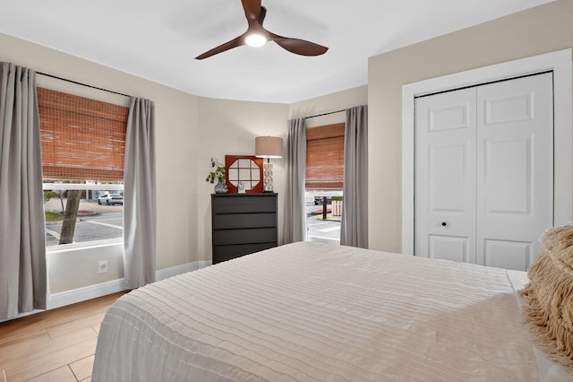 404 S M St Unit 1, Lake Worth Beach, FL 33460 - bedroom featuring light wood finished floors, baseboards, a closet, and a ceiling fan