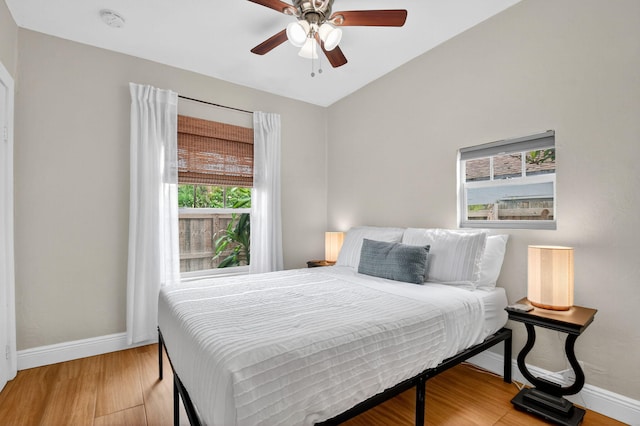 404 S M St Unit 1, Lake Worth Beach, FL 33460 - bedroom featuring light wood-style flooring, baseboards, ceiling fan, and lofted ceiling