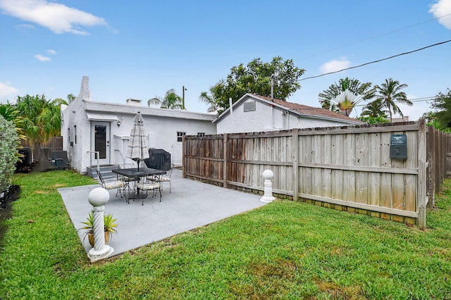 404 S M St Unit 1, Lake Worth Beach, FL 33460 - view of yard with a patio area