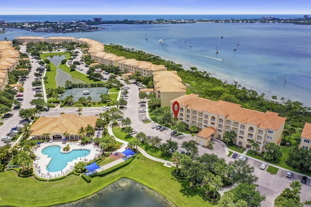 28 Harbour Isle Dr W Unit 101, Fort Pierce, FL 34949 - aerial overview of property's location featuring a nearby body of water, a pool, and apartment complex
