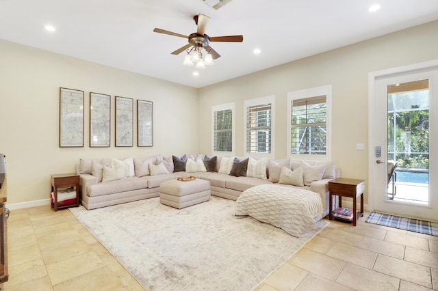 5621 SW Longspur Ln, Palm City, FL 34990 - living room featuring ceiling fan, recessed lighting, and baseboards