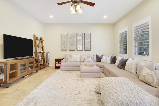5621 SW Longspur Ln, Palm City, FL 34990 - living room with a ceiling fan, stone finish floors, recessed lighting, and baseboards