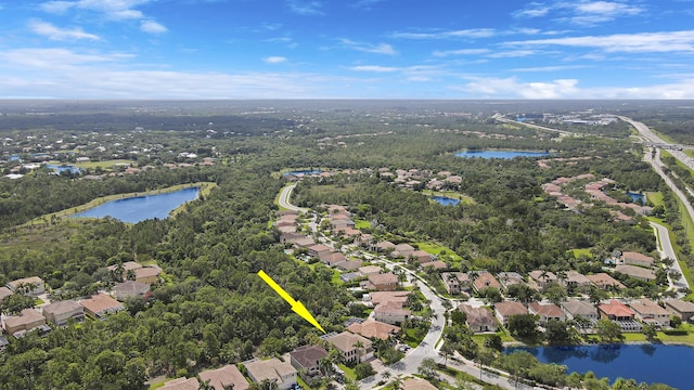 5621 SW Longspur Ln, Palm City, FL 34990 - aerial view of property's location with nearby suburban area and a nearby body of water