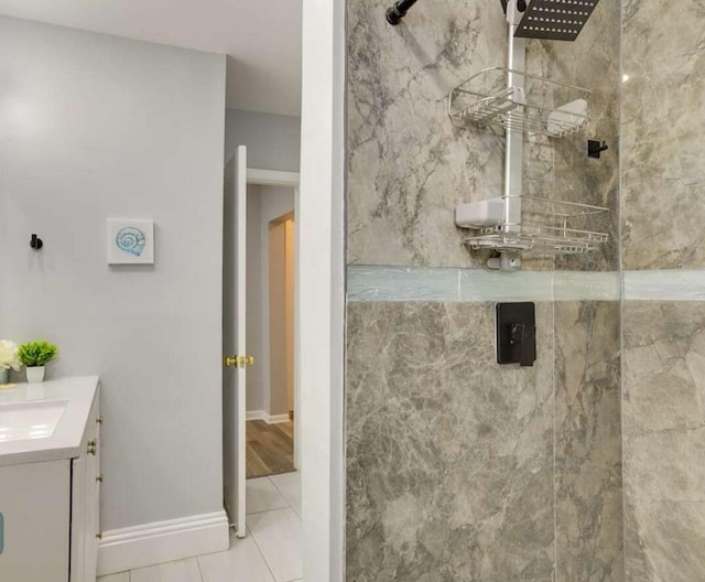 1022 State St, West Palm Beach, FL 33407 - full bath featuring a marble finish shower, vanity, and tile patterned flooring