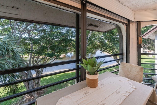 5380 Cedar Lake Dr Unit 303, Boynton Beach, FL 33437 - sunroom / solarium featuring a water view