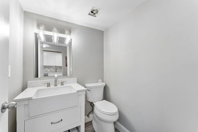 118 Lake Constance Dr Unit 118, West Palm Beach, FL 33411 - bathroom featuring toilet and vanity
