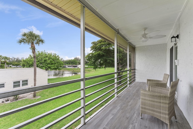 118 Lake Constance Dr Unit 118, West Palm Beach, FL 33411 - unfurnished sunroom with a water view and a ceiling fan