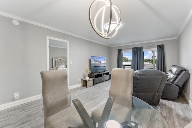 118 Lake Constance Dr Unit 118, West Palm Beach, FL 33411 - dining area with light wood finished floors, crown molding, and a chandelier
