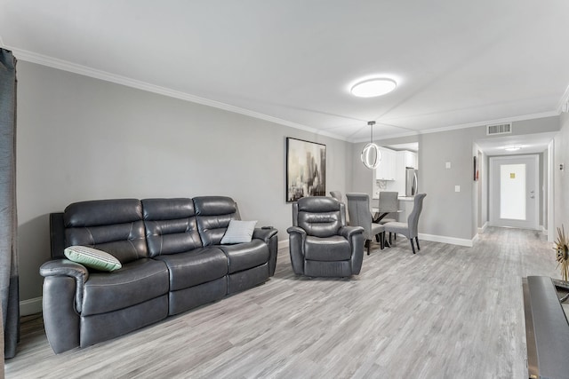118 Lake Constance Dr Unit 118, West Palm Beach, FL 33411 - living area featuring light wood-style flooring and ornamental molding
