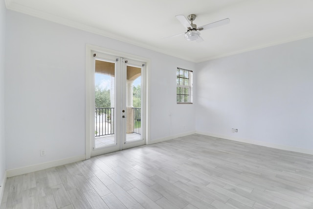 5605 SW Gray Fox Dr, Palm City, FL 34990 - empty room featuring crown molding, french doors, a ceiling fan, light wood-style flooring, and baseboards