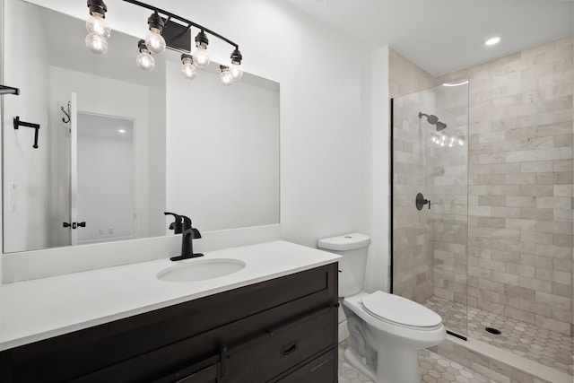 3571 SE Cobia Way, Stuart, FL 34997 - full bathroom with vanity, tiled shower, toilet, and tile patterned flooring