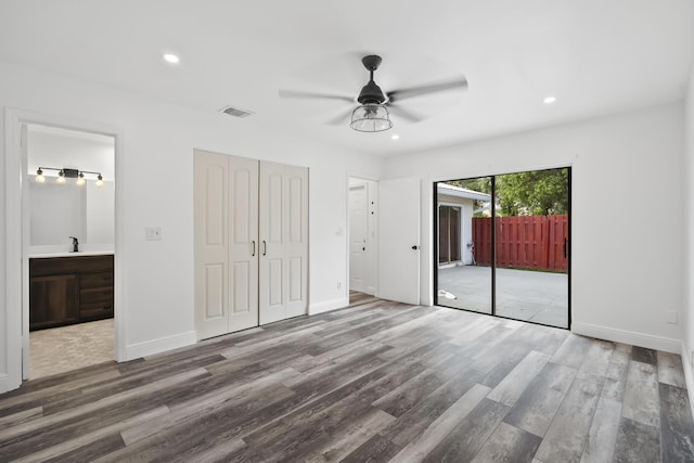 3571 SE Cobia Way, Stuart, FL 34997 - unfurnished bedroom featuring access to outside, wood finished floors, recessed lighting, and baseboards