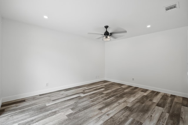 3571 SE Cobia Way, Stuart, FL 34997 - spare room featuring a ceiling fan, wood finished floors, baseboards, and recessed lighting