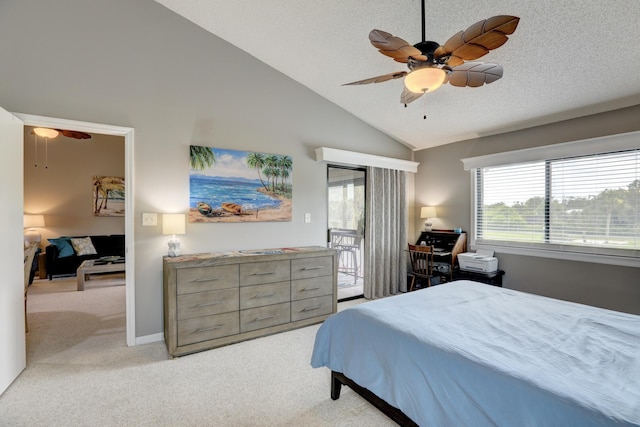 5725 Pelican Pointe Dr Unit 4, Sebastian, FL 32958 - bedroom featuring access to exterior, light colored carpet, vaulted ceiling, ceiling fan, and a textured ceiling