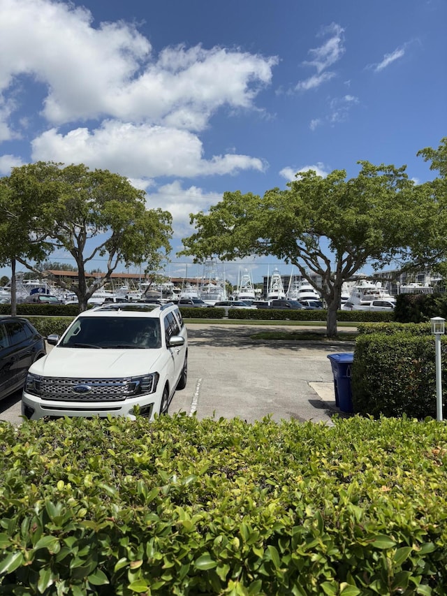 118 Yacht Club Dr Unit 1, North Palm Beach, FL 33408 - view of uncovered parking lot