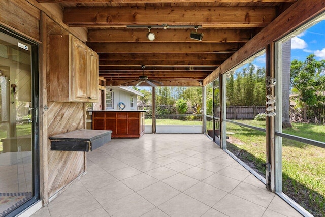 4694 Brady Blvd, Delray Beach, FL 33445 - unfurnished sunroom featuring rail lighting and a ceiling fan