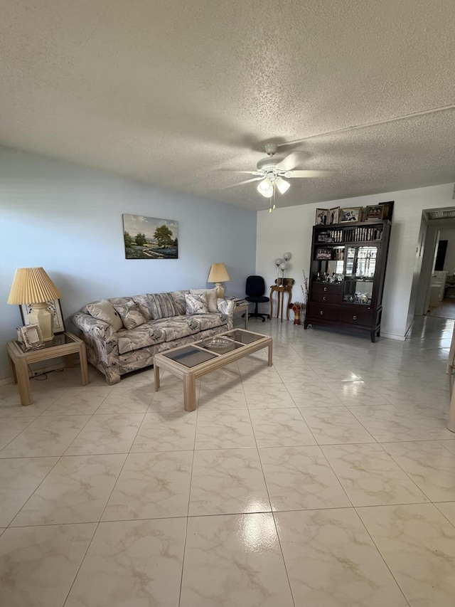 1041 Guildford C, Boca Raton, FL 33434 - living area with a ceiling fan and a textured ceiling
