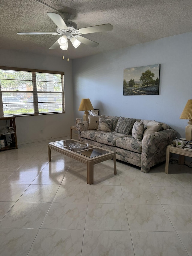 1041 Guildford C, Boca Raton, FL 33434 - living room with a ceiling fan and a textured ceiling